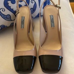Beautiful Prada tan and black slingback heels.